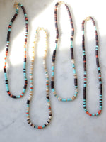 Heishi necklaces with shell, coral and turquoise